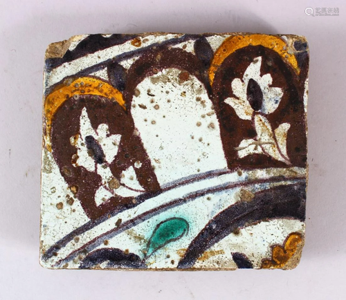 A 17TH CENTURY NORTH AFRICAN TILE, 15.5cm x 14cm.