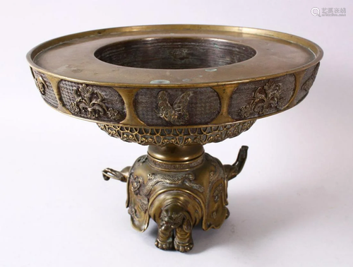 A JAPANESE BRONZE TRI ELEPHANT CENSER, the feet formed