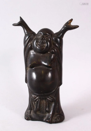 A CHINESE BRONZE FIGURE OF ELATED BUDDAH, stood with