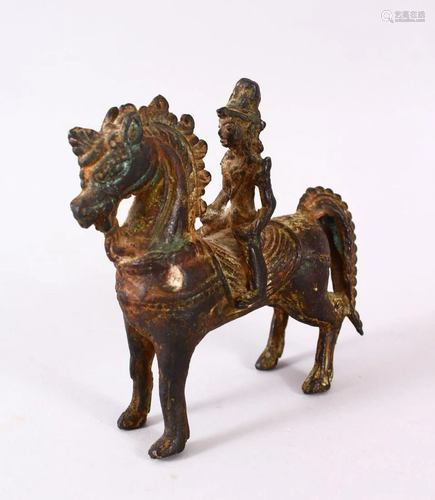 A 17TH CENTURY SOUTH INDIAN BRONZE MODEL OF A HOR…