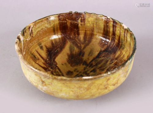 A GOOD IRAN STYLE POTTERY BOWL, decorated with brown &