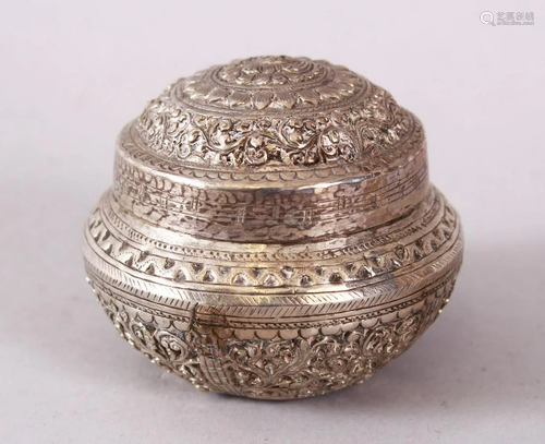 A SMALL INDIAN CIRCULAR WHITE METAL BOX & COVER,