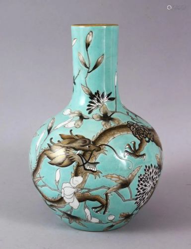 A CHINESE TURQUOISE GROUND DRAGON VASE, decorated…