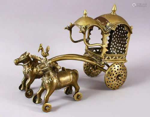 AN 18TH CENTURY INDIAN BRASS CHILDS TOY CHARIOT, 32cm