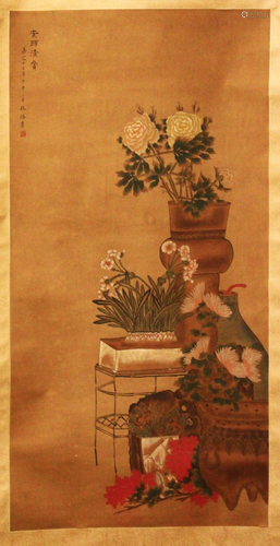 A CHINESE SCROLL PAINTING OF FLOWERS, painted with a