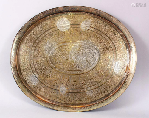 A LARGE INDIAN SILVER PLATED SERVING TRAY, with chased