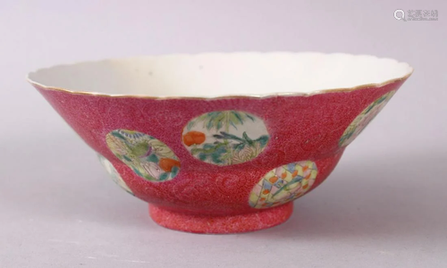 A CHINESE PINK GROUND FAMILLE ROSE PORCELAIN BOWL,