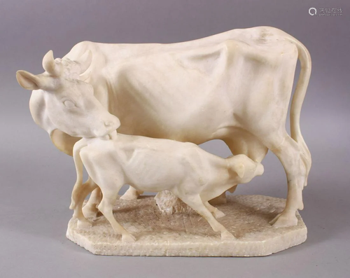 A 19TH CENTURY INDIAN ALABASTER MODEL OF NANDI COW…