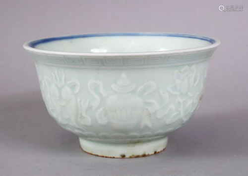 A CHINESE MING XUANDE STYLE CARVED CELADON PORCELAIN