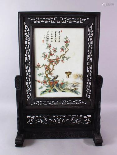 A CHINESE CARVED HARDWOOD & PORCELAIN FAMILLE …