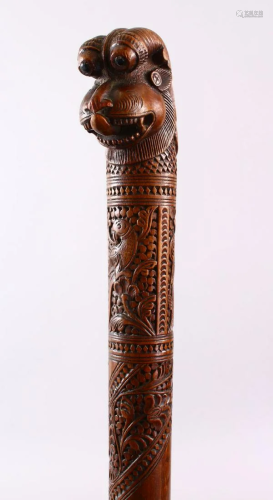 A GOOD LATE 19TH CENTURY INDIAN CARVED WOOD WALKING