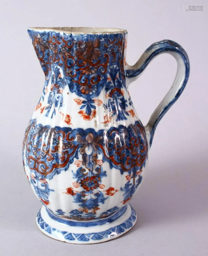 AN 18TH CENTURY CHINESE IMARI RIBBED PORCELAIN JUG,