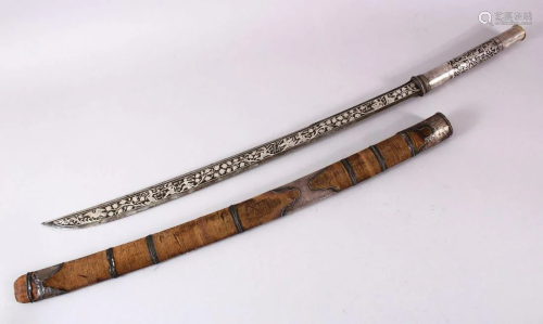 A FINE 19TH CENTURY BURMESE DHA SWORD with niello
