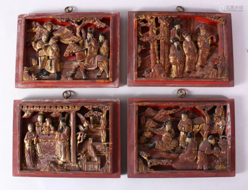 FOUR SMALL CHINESE CARVED AND GILDED DECORATED PANELS.