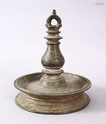 A GOOD INDIAN BRONZE OIL LAMP, Signed and dated to the