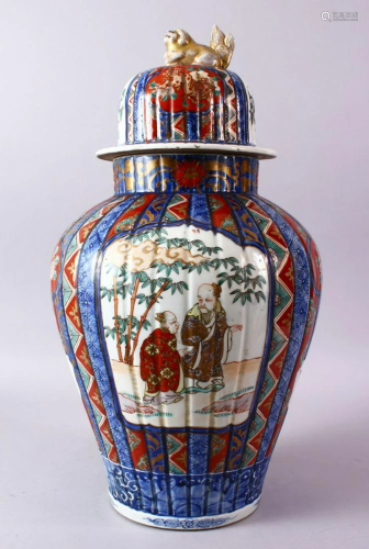 A LARGE IMARI VASE AND COVER, the ribbed body painted