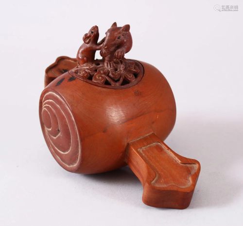 A JAPANESE CARVED WOODEN CARVED KORO, carved in…