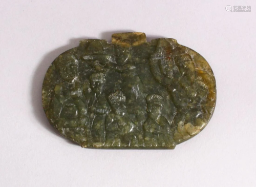 A PERSIAN QAJAR CARVED JADE PENDANT - carved with