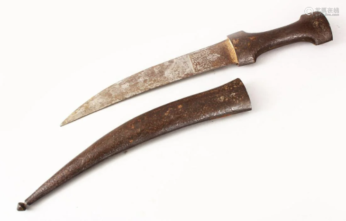 AN EARLY QAJAR STEEL DAGGER, the sheath carved with