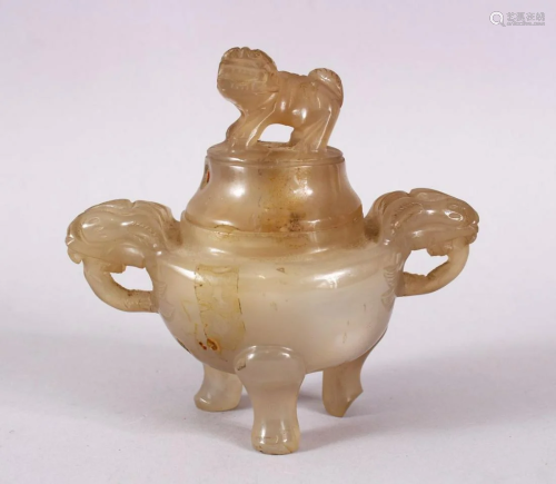 A CHINESE 19TH CENTURY CARVED JADE OR HARDSTONE CEN…