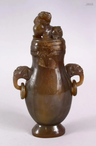 A CHINESE CARVED JADE / JADE LIKE TWIN HANDLE VASE &