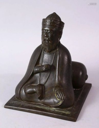 AN 18TH/19TH CENTURY BRONZE SEATED FIGURE OF A SCH…