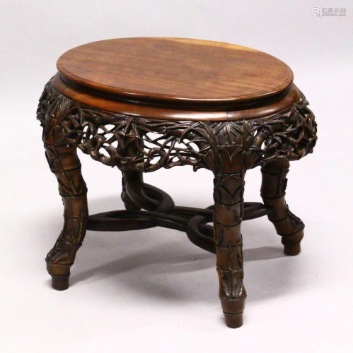 A LATE 19TH CENTURY CHINESE HARDWOOD OVAL TABLE, …