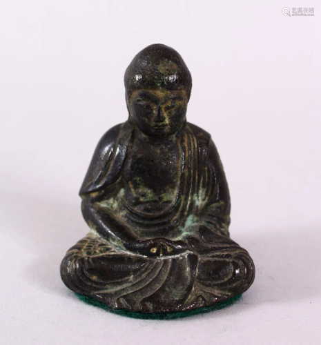A CHINESE BRONZE FIGURE OF SEATED BUDDHA, seated with