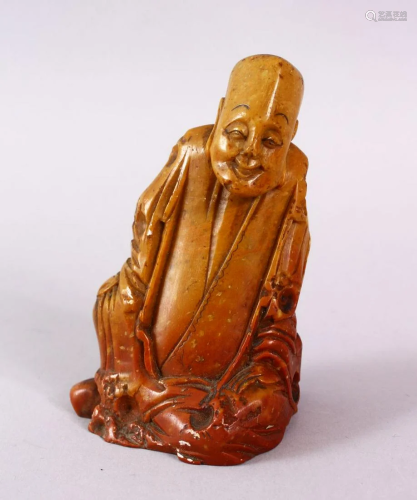 A CHINESE CARVE3D SOAPSTONE FIGURE OF A JOLLY MA…