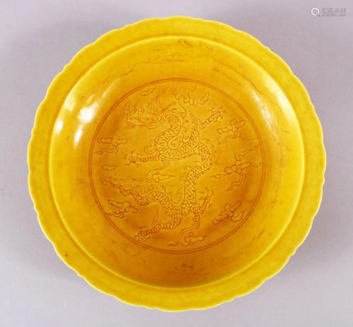 A CHINESE YELLOW INCISED PORCELAIN DRAGON DISH,