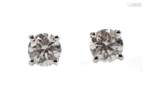 A PAIR OF CERTIFICATED DIAMOND STUD EARRINGS