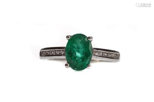 AN EMERALD AND DIAMOND RING