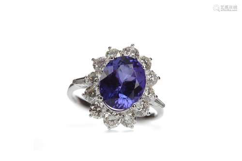 A TANZANITE AND DIAMOND RING