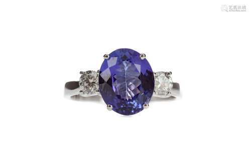 A TANZANITE AND DIAMOND RING