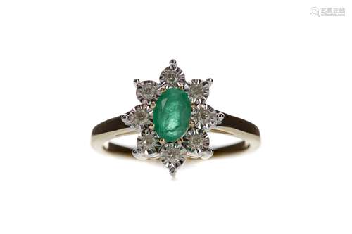 AN EMERALD AND DIAMOND CLUSTER RING