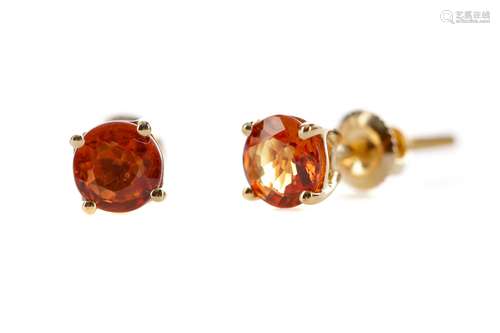 A PAIR OF TREATED ORANGE SAPPHIRE STUD EARRINGS