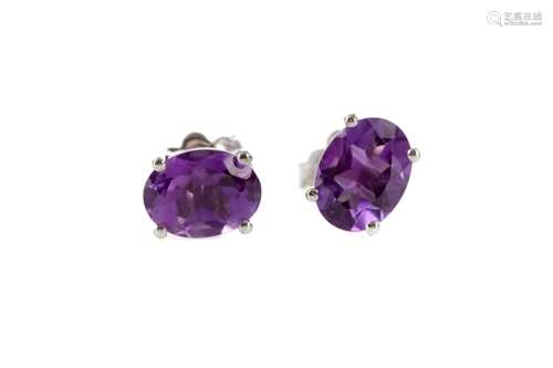 A PAIR OF AMETHYST STUD EARRINGS