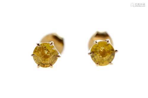 A PAIR OF TREATED YELLOW SAPPHIRE STUD EARRINGS