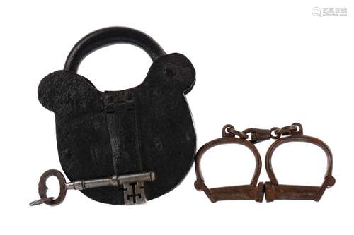 A PAIR OF EARLY 20TH CENTURY HIATT CAST METAL HANDCUFFS, ALO...