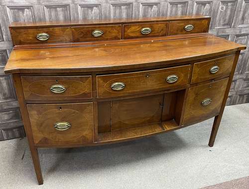 A REGENCY MAHOGANY BOW FRONTED SIDEBOARD