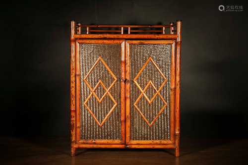 A BAMBOO TEA CABINET