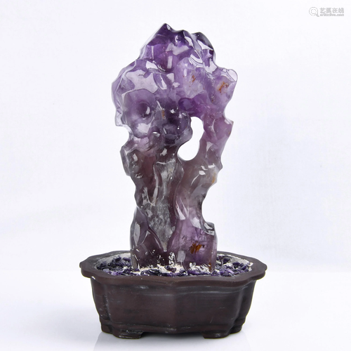 A PURPLE CRYSTAL BOULDER