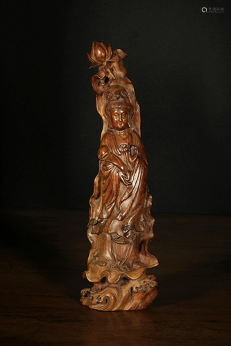 A CARVED HUANGHUALI GUANYIN