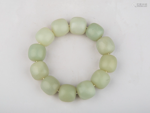 A WHITE JADE BRACELET