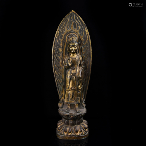 A GILT-BRONZE STANDING GUANYIN.NORTHER WEI PERIOD