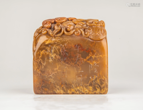 A CARVED SOAPSTONE SEAL