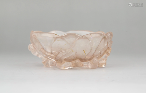 A CARVED CRYSTAL WASHER