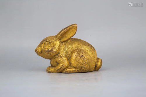 A GILT-BRONZE RABBIT PAPER WEIGHT