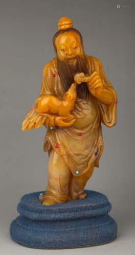 A CARVED GEM'S INLAID TIANHUANGSTONE FIGURE