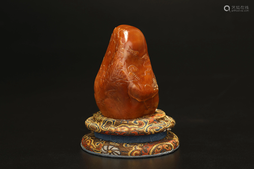 A CARVED SOAPSTONE SEAL